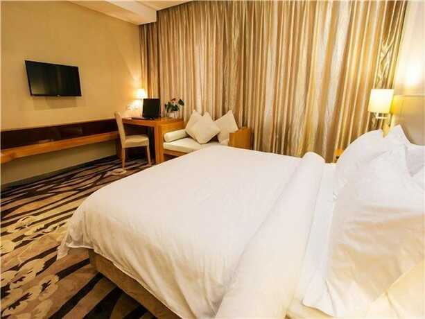 Imagen de la habitación del Hotel Metropolo Wuhan Wanda Mansion. Foto 17