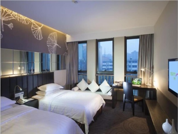 Imagen de la habitación del Hotel Metropolo Wuhan Wanda Mansion. Foto 19