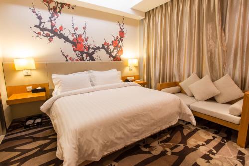 Imagen de la habitación del Hotel Metropolo, Wuhan, Wanda Residence, Riverside Avenu. Foto 8