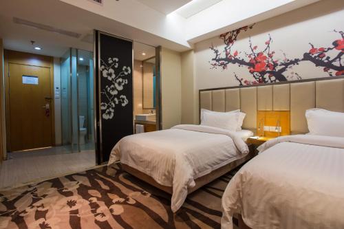 Imagen de la habitación del Hotel Metropolo, Wuhan, Wanda Residence, Riverside Avenu. Foto 9