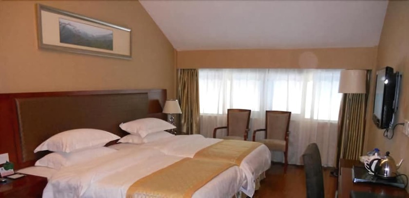 Imagen de la habitación del Hotel Metropolo Wuyishan Resort. Foto 8