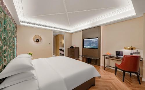 Imagen de la habitación del Hotel Metropolo Xuzhou High-speed Railway Station Jinlonghu. Foto 10