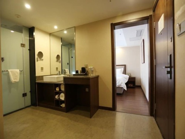 Imagen de la habitación del Hotel Metropolo Xuzhou Pengcheng Square Golden Shield. Foto 9