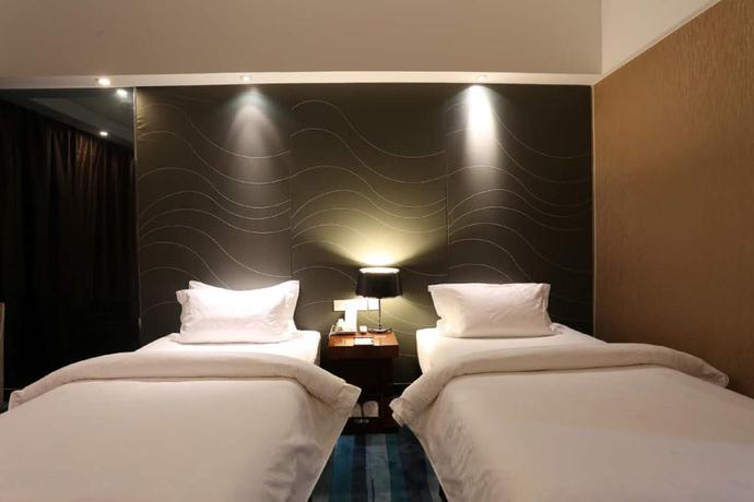 Imagen de la habitación del Hotel Metropolo Zhenjiang Railway Station Wanda Plaza. Foto 17