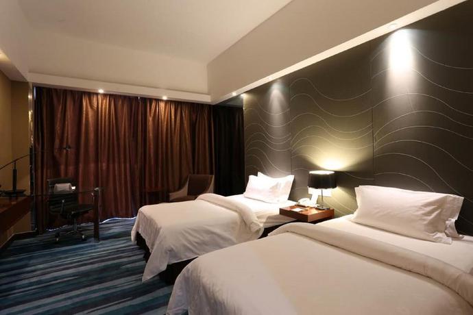 Imagen de la habitación del Hotel Metropolo Zhenjiang Railway Station Wanda Plaza. Foto 19