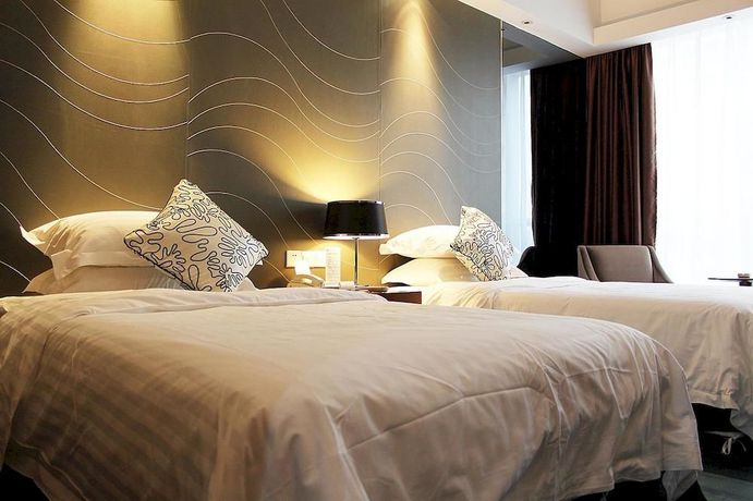 Imagen de la habitación del Hotel Metropolo Zhenjiang Railway Station Wanda Square. Foto 8