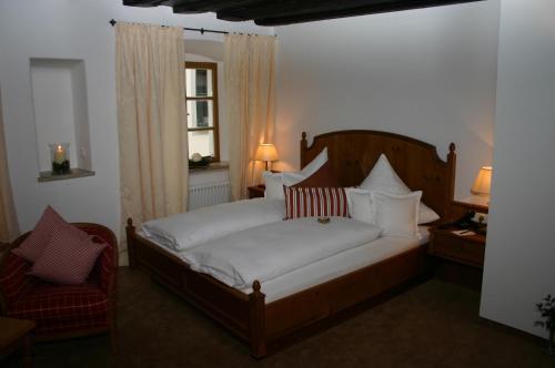 Imagen de la habitación del Hotel Metzgerei Gasthof Romantikhotel Der Millipp. Foto 14