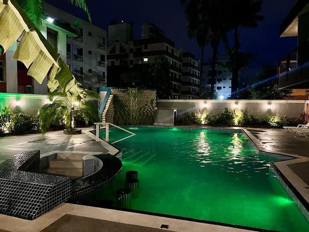 Imagen de la piscina del Hotel Meu Lugar na Praia Tropical. Foto 17
