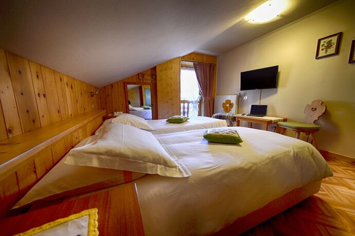 Imagen de la habitación del Hotel Meuble Cima Bianca Garni. Foto 11
