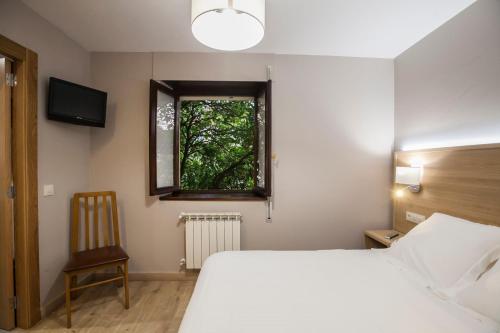 Imagen de la habitación del Hotel Meve. Foto 7