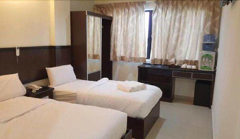 Imagen de la habitación del Hotel Mewah Impiana. Foto 2
