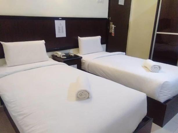 Imagen de la habitación del Hotel Mewah Impiana. Foto 4