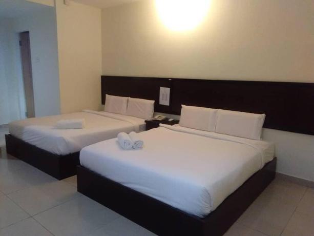 Imagen de la habitación del Hotel Mewah Impiana. Foto 5