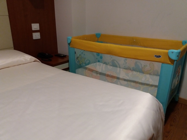 Imagen de la habitación del Hotel Mezzaluna. Foto 10