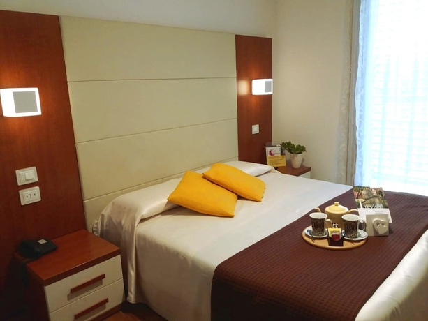 Imagen de la habitación del Hotel Mezzaluna. Foto 13