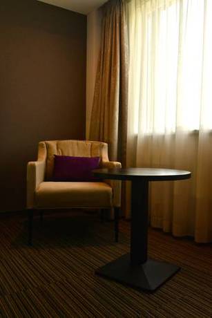 Imagen de la habitación del Hotel Mezzo Beringen. Foto 15
