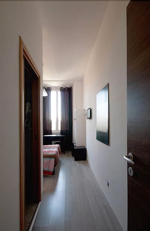 Imagen de la habitación del Hotel Mf. Foto 9