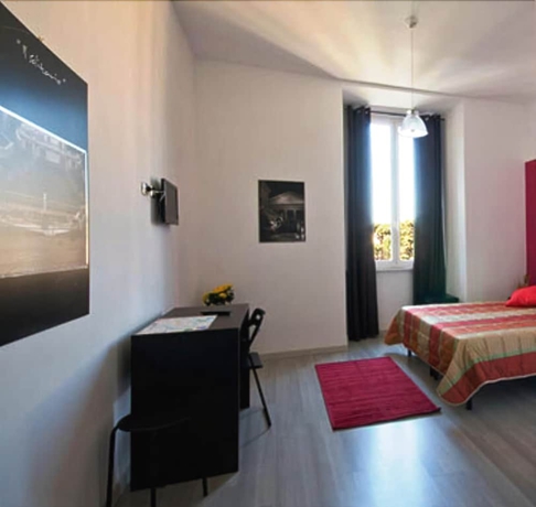 Imagen de la habitación del Hotel Mf. Foto 11