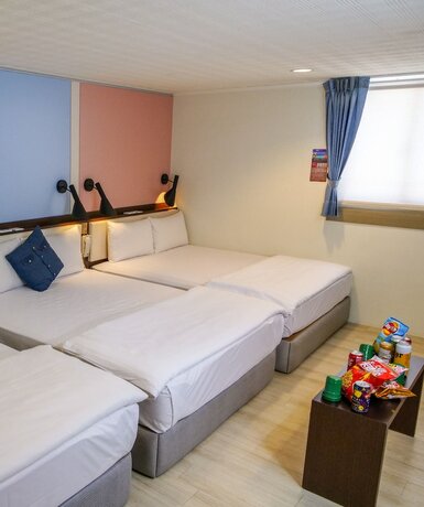 Imagen de la habitación del Hotel Mf Penghu. Foto 16