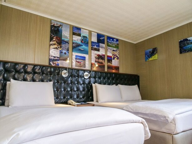 Imagen de la habitación del Hotel Mf Penghu. Foto 17