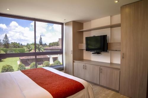 Imagen de la habitación del Hotel Mg Hotels and Suites. Foto 6