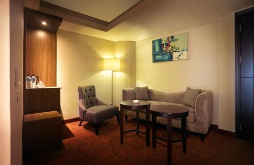 Imagen de la habitación del Hotel Mg Setos Semarang. Foto 7