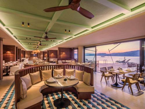 Imagen del bar/restaurante del Hotel Mgallery The Bodrum Hotel Yalikavak. Foto 9