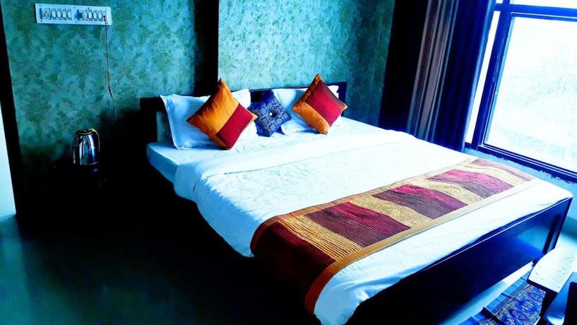 Imagen de la habitación del Hotel Mgh 114 Krishna Udaipur. Foto 5