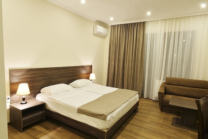 Imagen de la habitación del Hotel Mgk. Foto 2