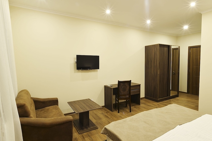 Imagen de la habitación del Hotel Mgk. Foto 3
