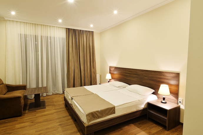 Imagen de la habitación del Hotel Mgk. Foto 4