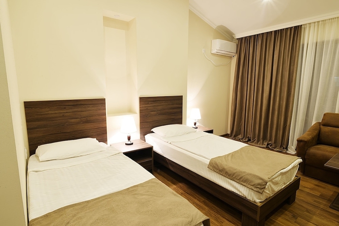 Imagen de la habitación del Hotel Mgk. Foto 5