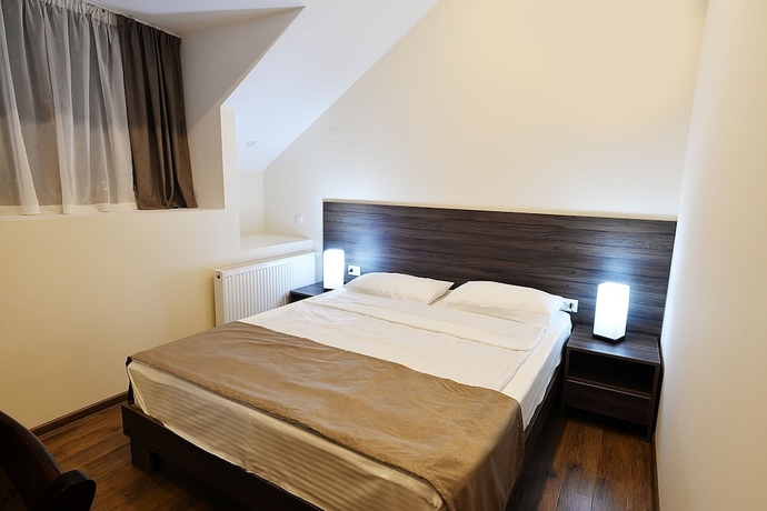 Imagen de la habitación del Hotel Mgk. Foto 6