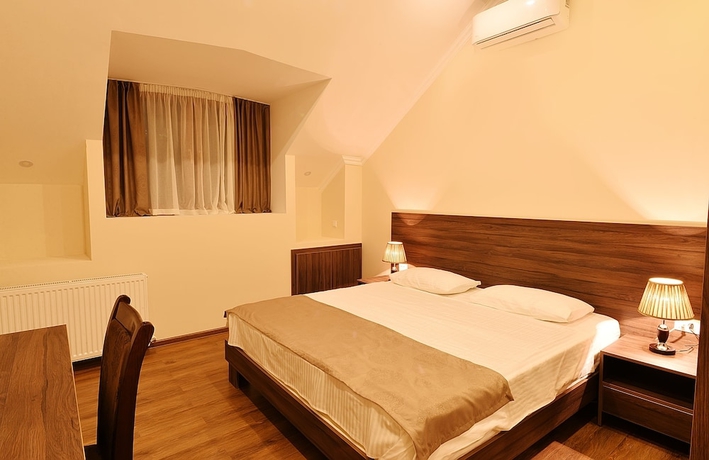 Imagen de la habitación del Hotel Mgk. Foto 8