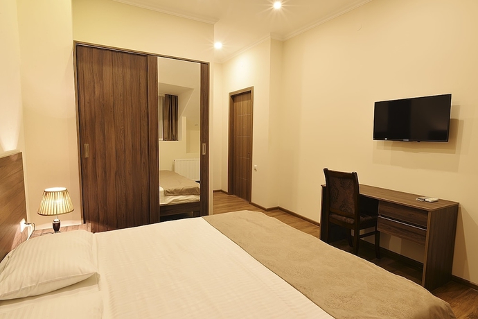 Imagen de la habitación del Hotel Mgk. Foto 9