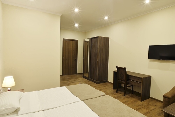 Imagen de la habitación del Hotel Mgk. Foto 10