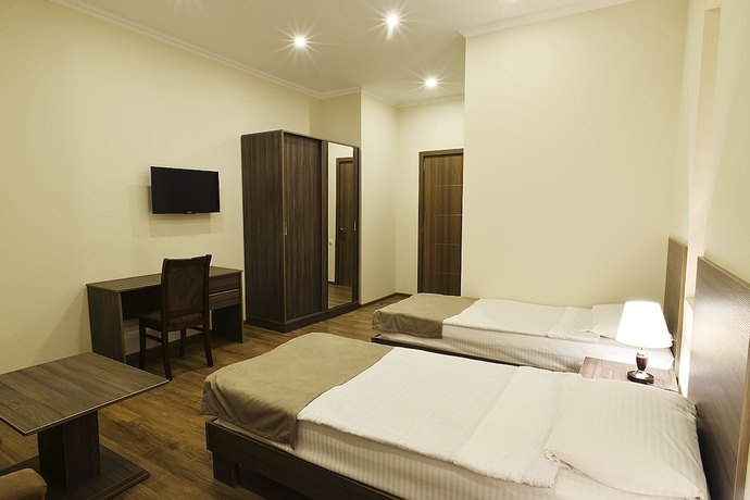 Imagen de la habitación del Hotel Mgk. Foto 11