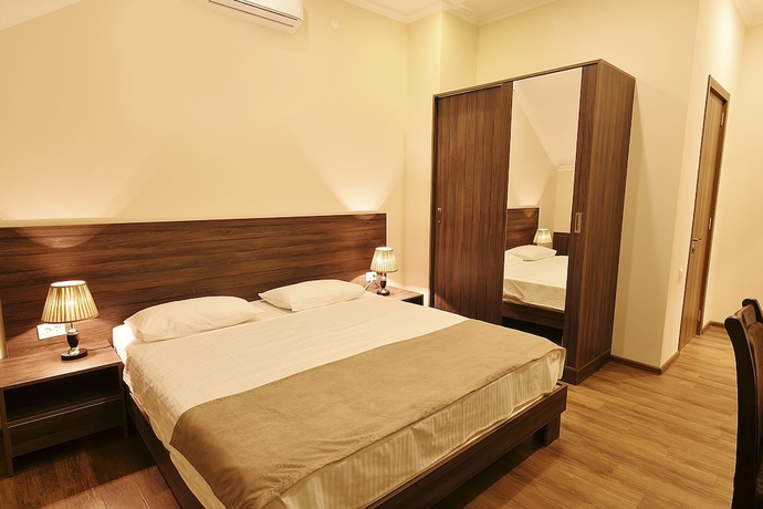 Imagen de la habitación del Hotel Mgk. Foto 12