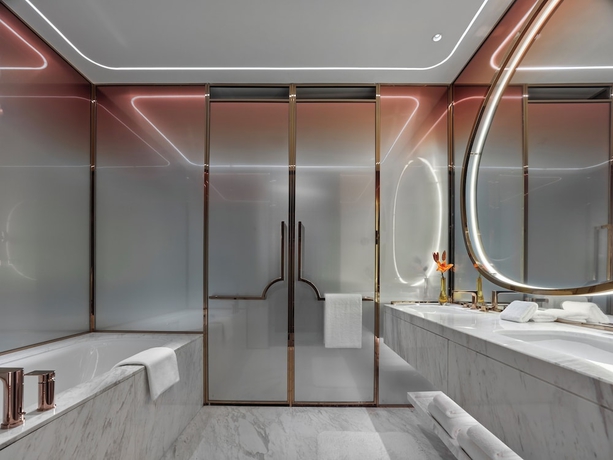 Imagen de la habitación del Hotel Mgm Qingdao. Foto 11