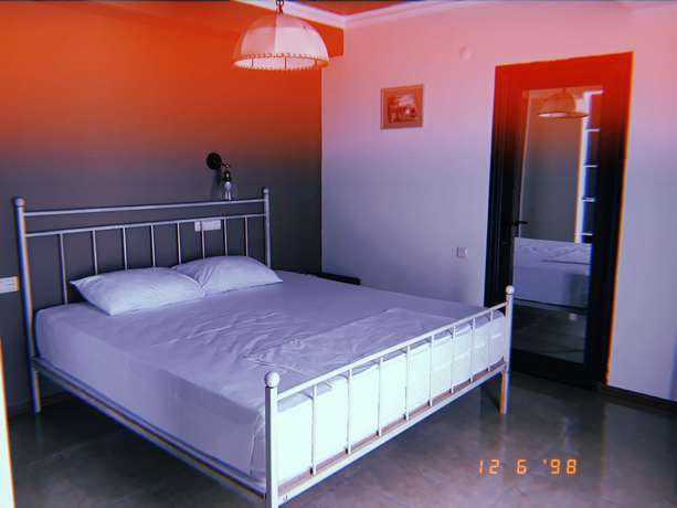 Imagen de la habitación del Hotel Mgzavrebi Gonio Aparthotel. Foto 4