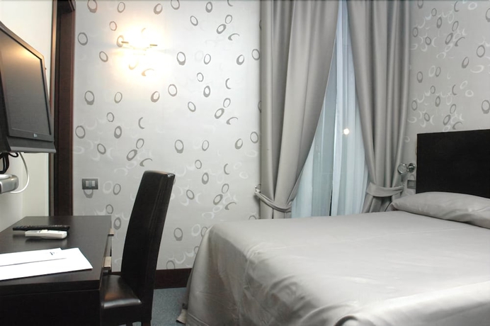 Imagen de la habitación del Hotel Mh Design. Foto 5