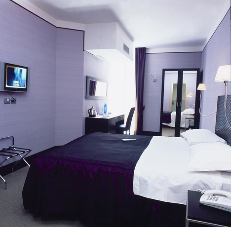 Imagen de la habitación del Hotel Mh Design. Foto 6