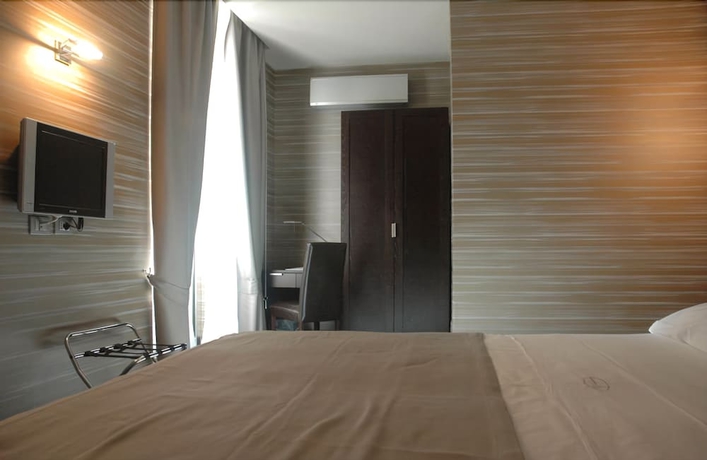 Imagen de la habitación del Hotel Mh Design. Foto 12