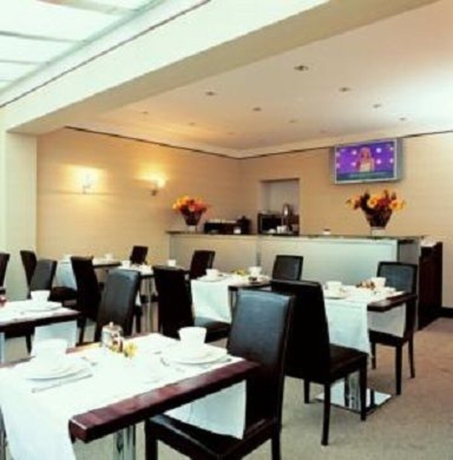 Imagen del bar/restaurante del Hotel Mh Design. Foto 4