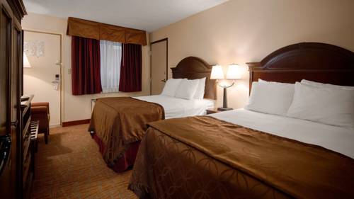 Imagen de la habitación del Hotel Mho Inn and Suites. Foto 4