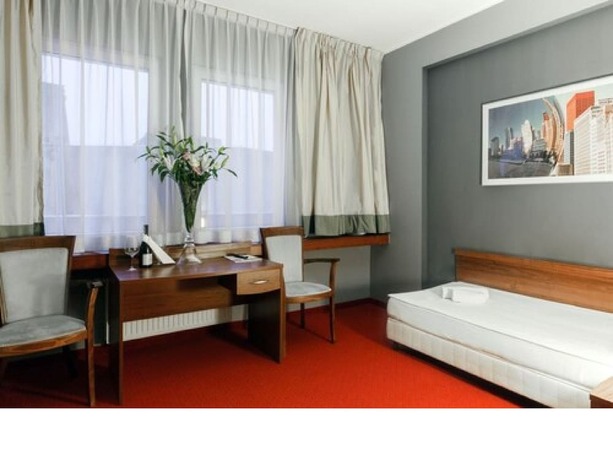 Imagen de la habitación del Hotel Mhotel. Foto 12