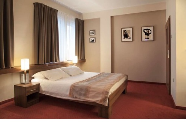 Imagen de la habitación del Hotel Mhotel. Foto 16