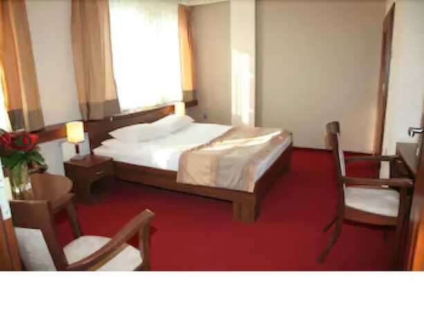 Imagen de la habitación del Hotel Mhotel. Foto 17