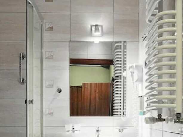 Imagen de la habitación del Hotel Mhotel. Foto 21