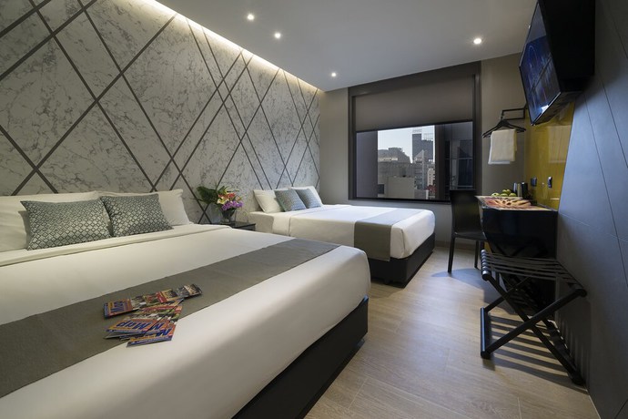 Imagen de la habitación del Hotel Mi Bencoolen. Foto 4